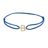Diamond initial b silk bracelet in 14K yellow gold on blue silk