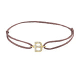 Diamond initial b silk bracelet in 14K yellow gold on brown silk