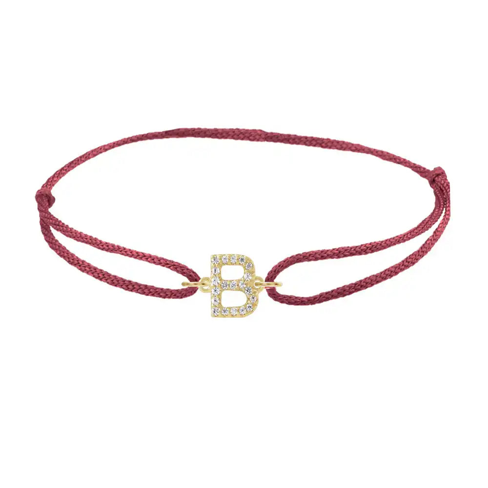 Diamond initial b silk bracelet in 14K yellow gold on burgundy silk
