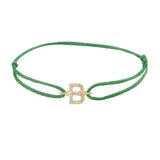 Diamond initial b silk bracelet in 14K yellow gold on emerald silk