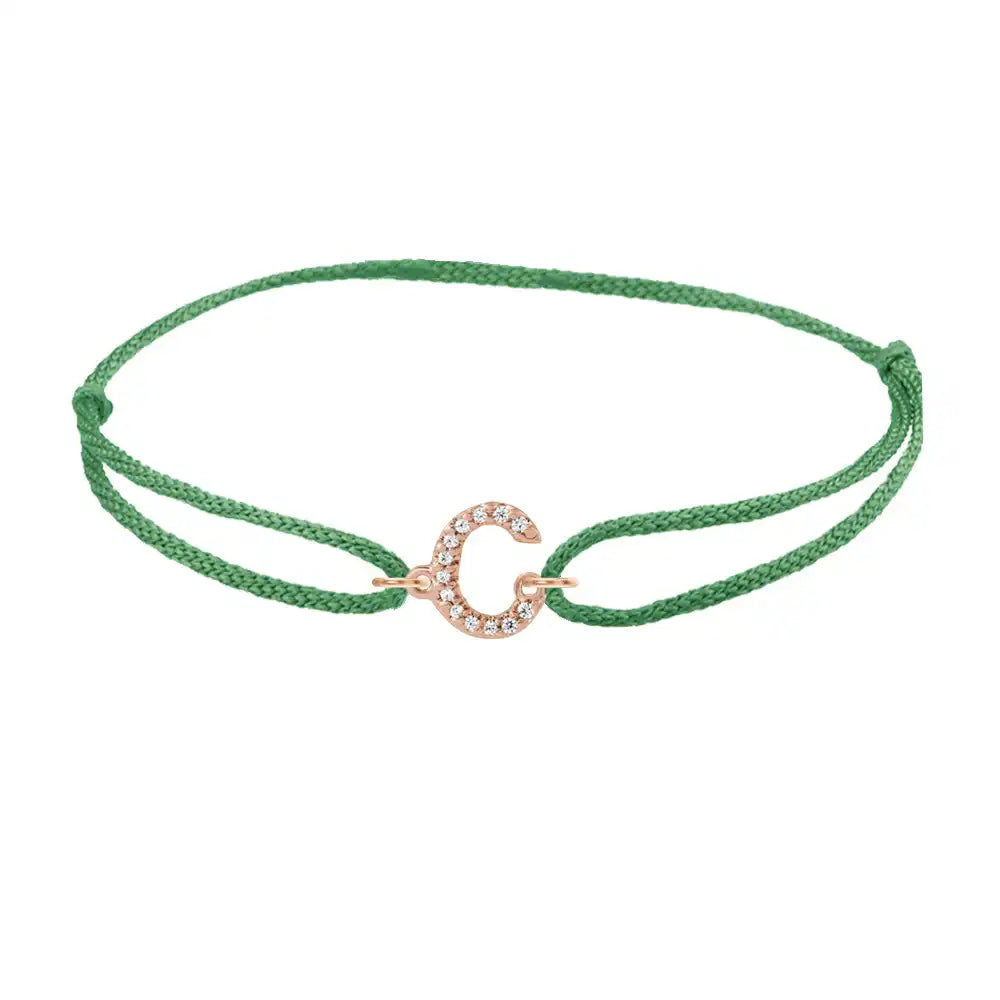 Diamond initial c silk bracelet in 14K rose gold on emerald silk