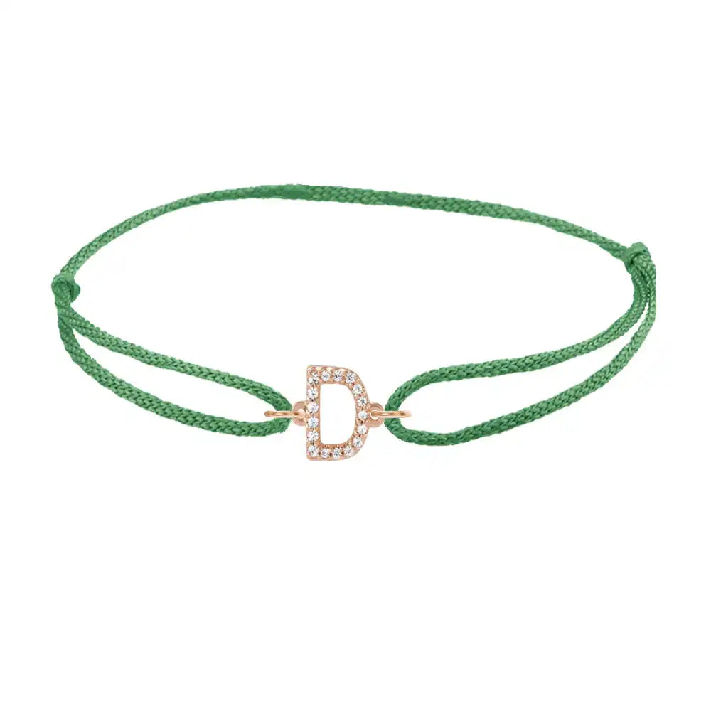 Diamond initial d silk bracelet in 14K rose gold on emerald silk