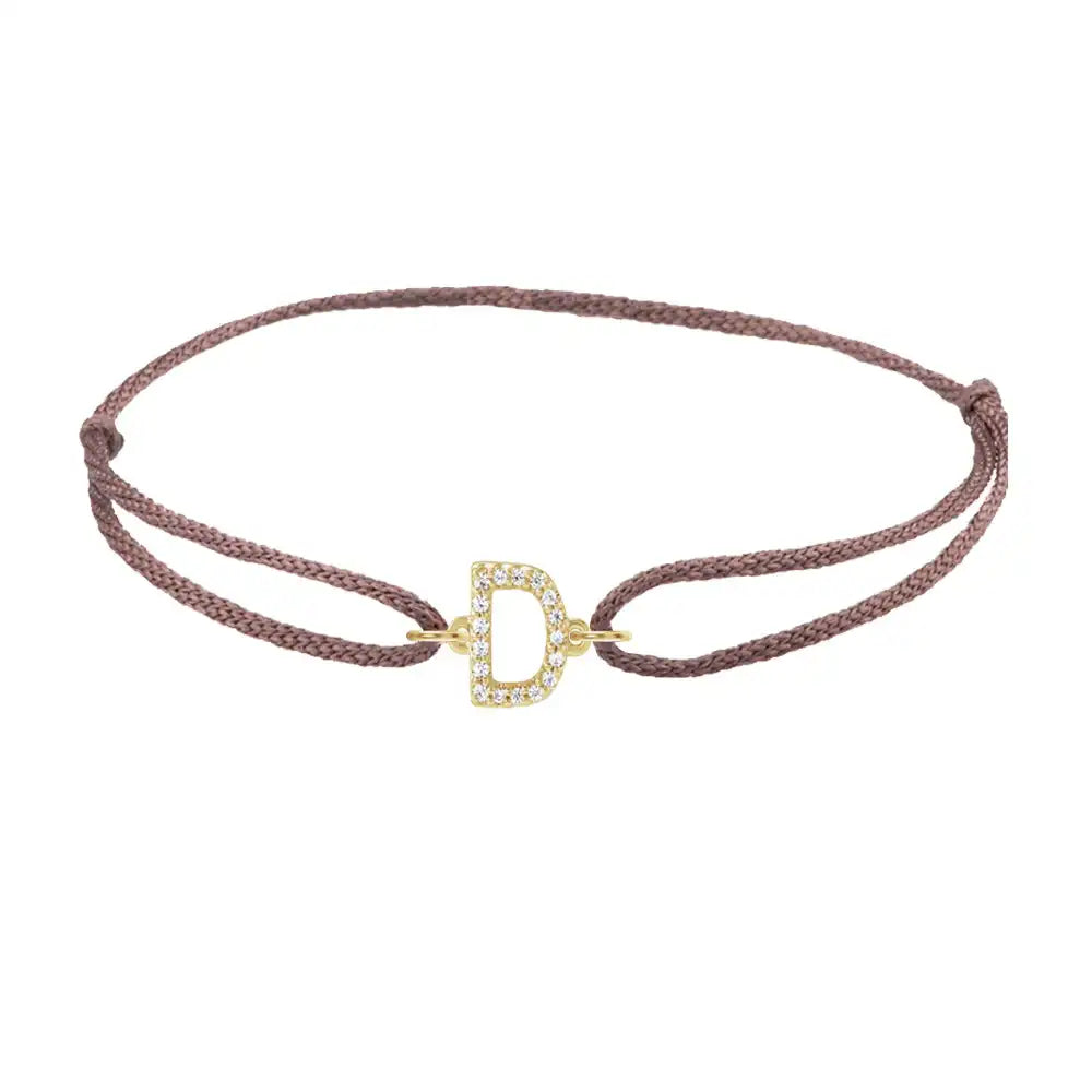 Diamond initial d silk bracelet in 14K yellow gold on brown silk