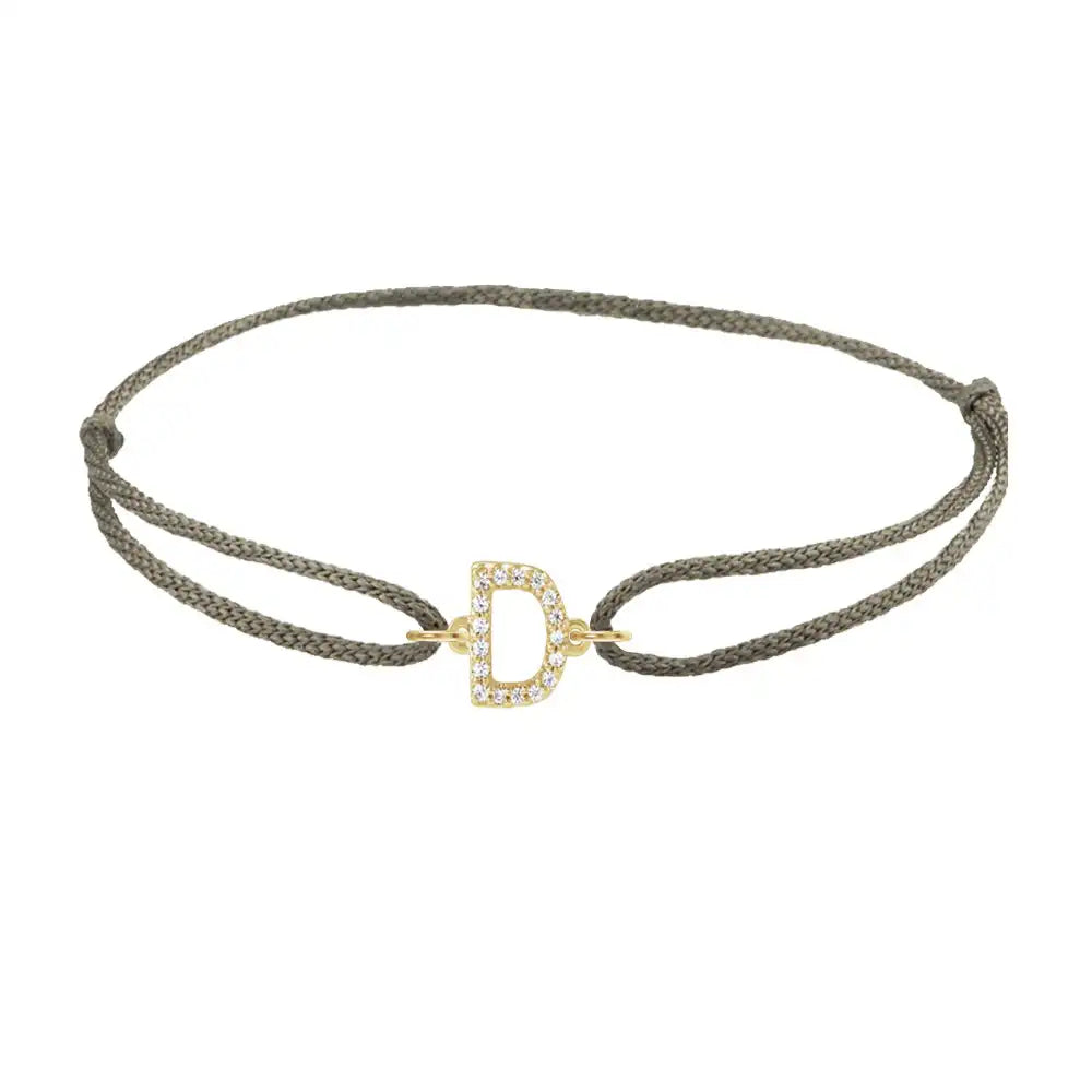 Diamond initial d silk bracelet in 14K yellow gold on olive silk