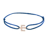 Diamond initial e silk bracelet in 14K rose gold on blue silk