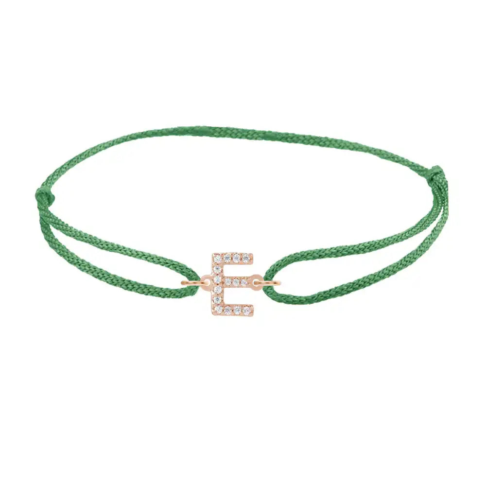 Diamond initial e silk bracelet in 14K rose gold on emerald silk