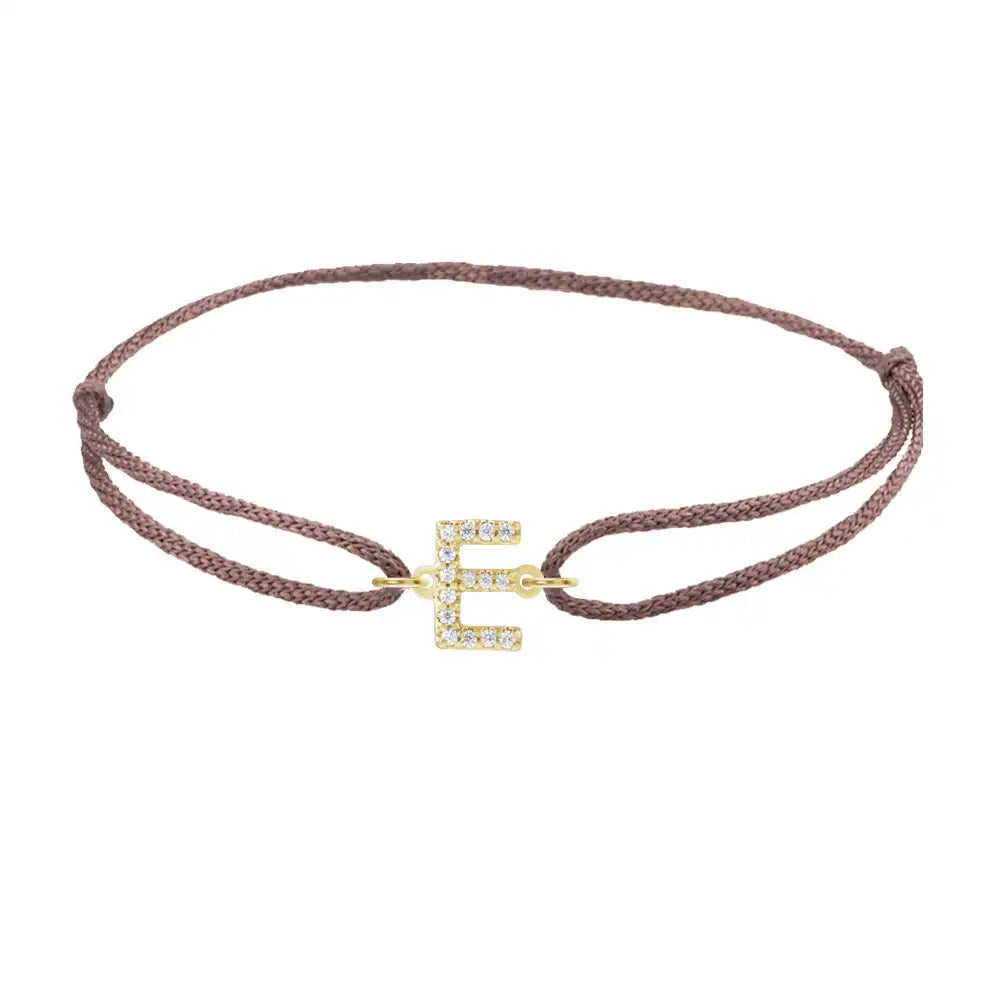 Diamond initial e silk bracelet in 14K yellow gold on brown silk