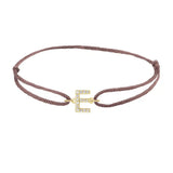 Diamond initial e silk bracelet in 14K yellow gold on brown silk