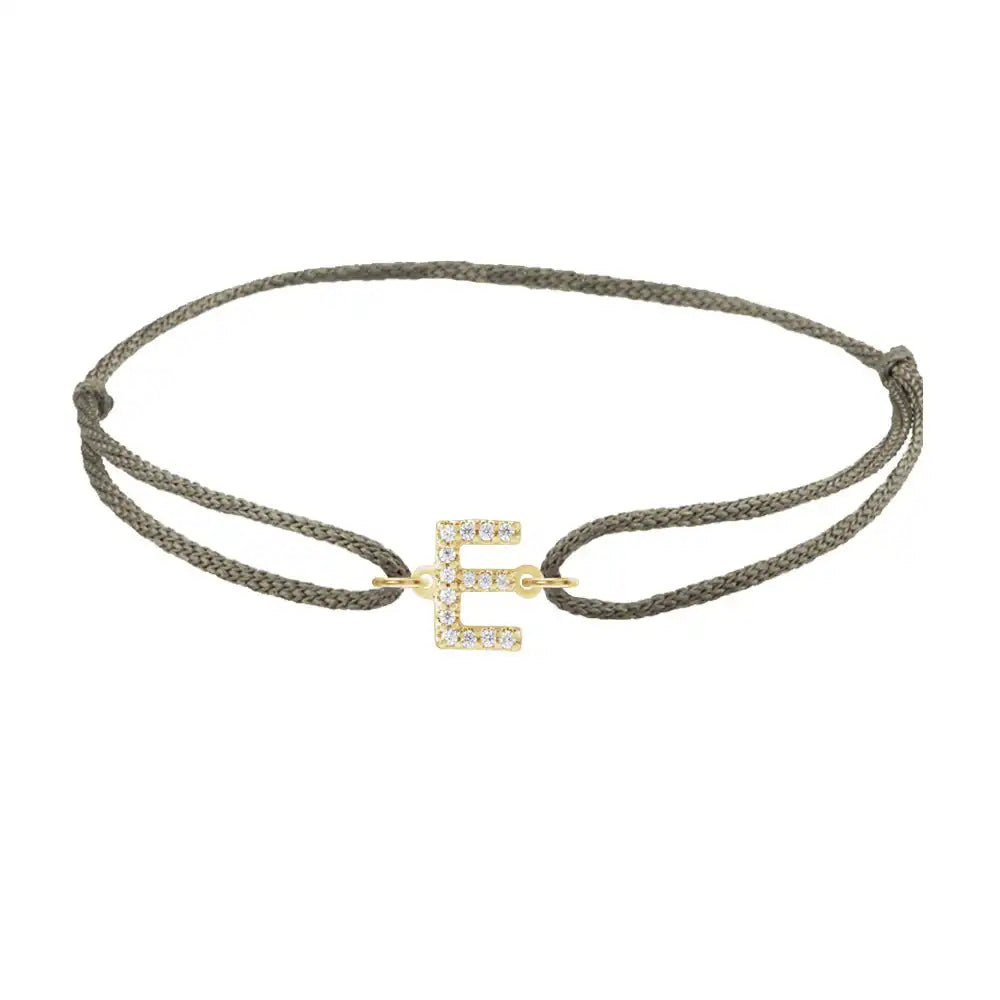 Diamond initial e silk bracelet in 14K yellow gold on olive silk