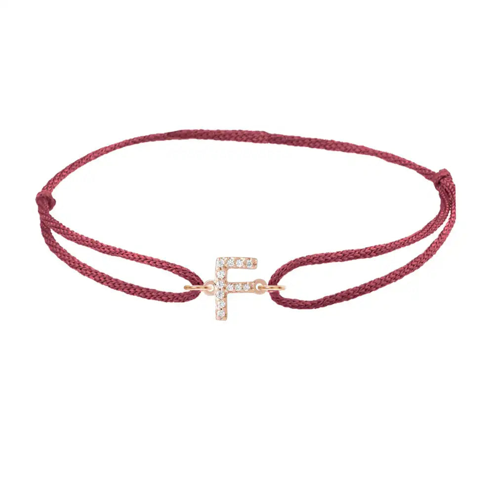 Diamond initial f silk bracelet in 14K rose gold on burgundy silk