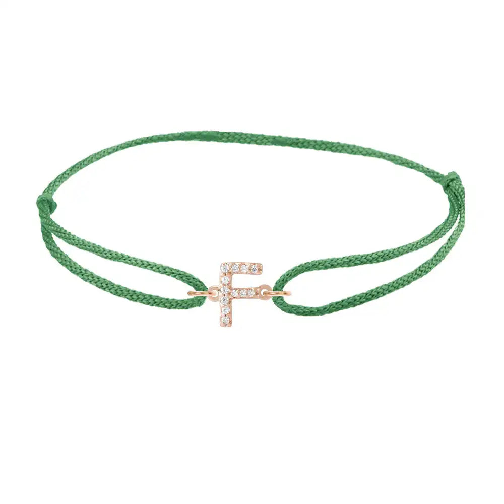 Diamond initial f silk bracelet in 14K rose gold on emerald silk