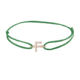 Diamond initial f silk bracelet in 14K rose gold on emerald silk
