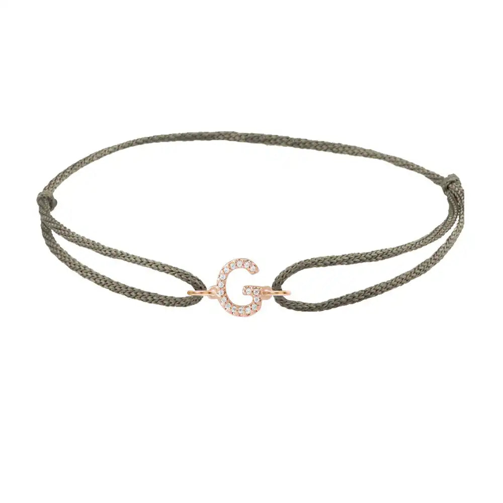 Diamond initial g silk bracelet in 14K rose gold on olive silk