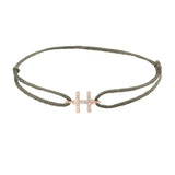 Diamond initial h silk bracelet in 14K rose gold on olive silk