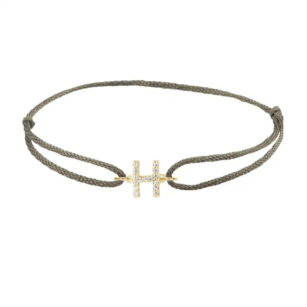 Diamond initial h silk bracelet in 14K yellow gold on olive silk