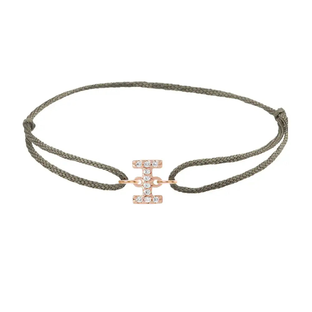 Diamond initial i silk bracelet in 14K rose gold on olive silk