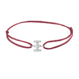 Diamond initial i silk bracelet in 14K white gold on burgundy silk