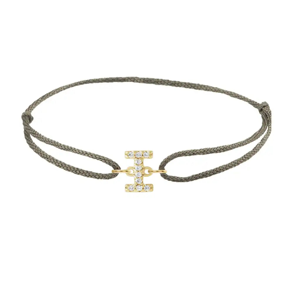 Diamond initial i silk bracelet in 14K yellow gold on olive silk