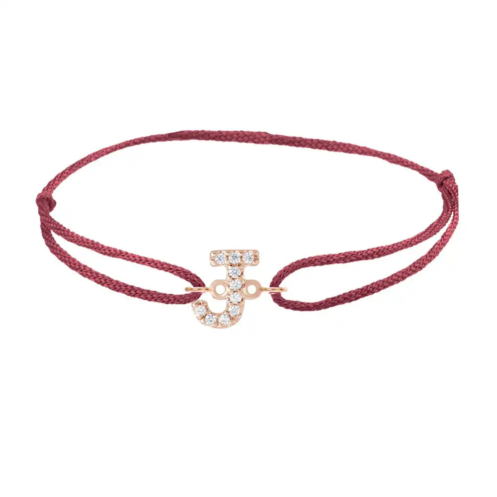 Diamond initial j silk bracelet in 14K rose gold on burgundy silk