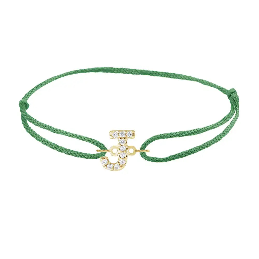 Diamond initial j silk bracelet in 14K yellow gold on emerald silk