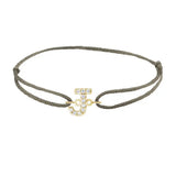 Diamond initial j silk bracelet in 14K yellow gold on olive silk