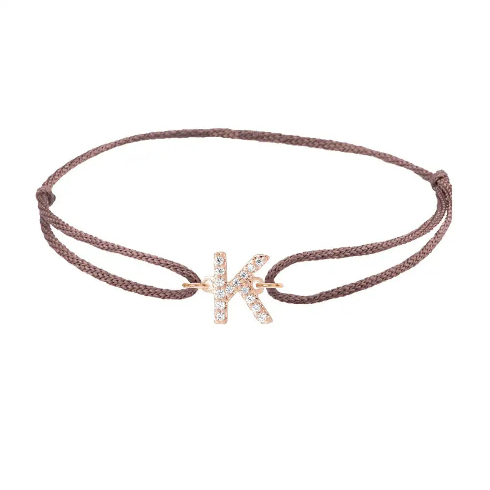 Diamond initial k silk bracelet in 14K rose gold on brown silk