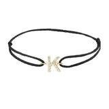 Diamond initial k silk bracelet in 14K yellow gold on black silk