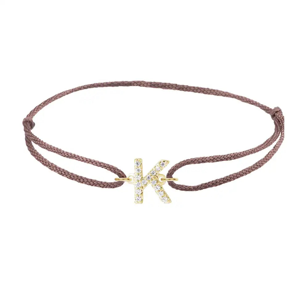 Diamond initial k silk bracelet in 14K yellow gold on brown silk