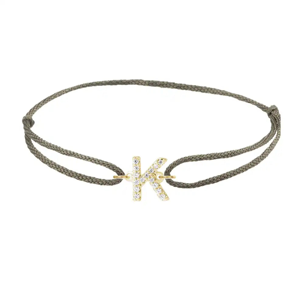 Diamond initial k silk bracelet in 14K yellow gold on olive silk