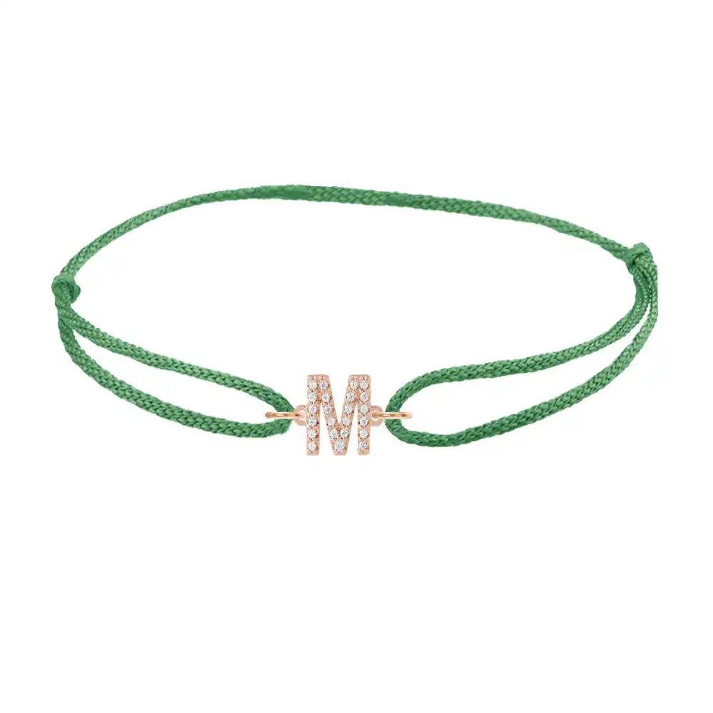 Diamond initial m silk bracelet in 14K rose gold on emerald silk