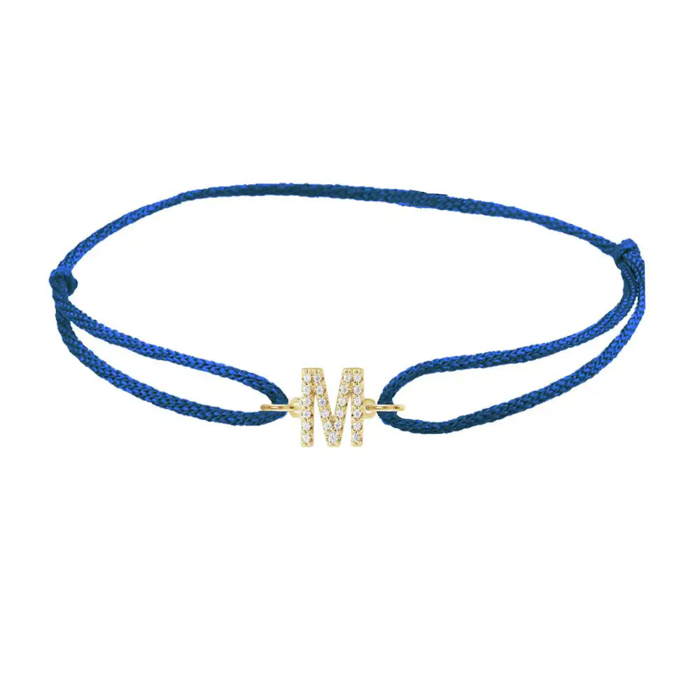 Diamond initial m silk bracelet in 14K yellow gold on blue silk