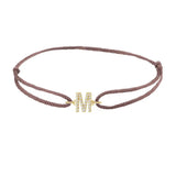 Diamond initial m silk bracelet in 14K yellow gold on brown silk
