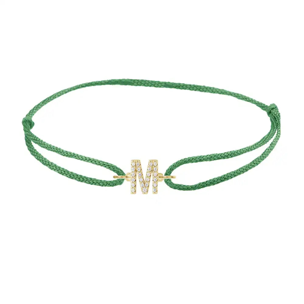 Diamond initial m silk bracelet in 14K yellow gold on emerald silk