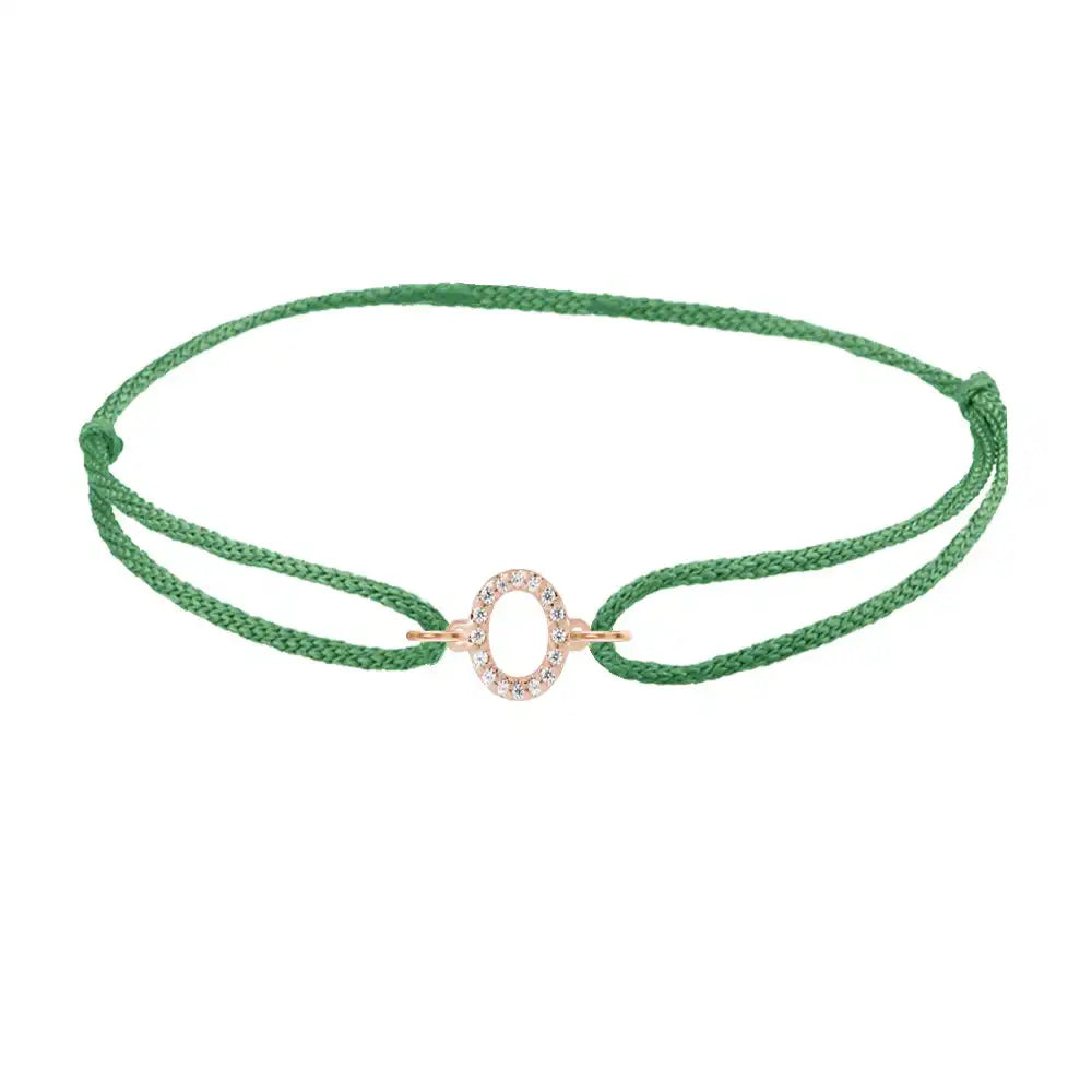 Diamond initial o silk bracelet in 14K rose gold on emerald silk