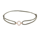 Diamond initial o silk bracelet in 14K rose gold on olive silk