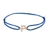 Diamond initial p silk bracelet in 14K rose gold on blue silk