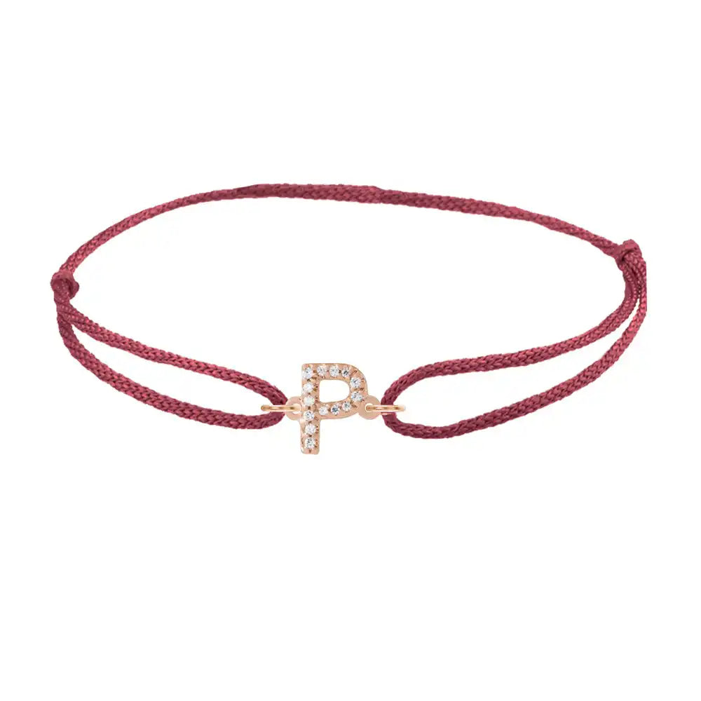 Diamond initial p silk bracelet in 14K rose gold on burgundy silk