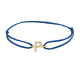 Diamond initial p silk bracelet in 14K yellow gold on blue silk