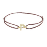 Diamond initial p silk bracelet in 14K yellow gold on brown silk