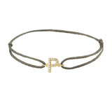 Diamond initial p silk bracelet in 14K yellow gold on olive silk