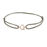 Diamond initial q silk bracelet in 14K rose gold on olive silk