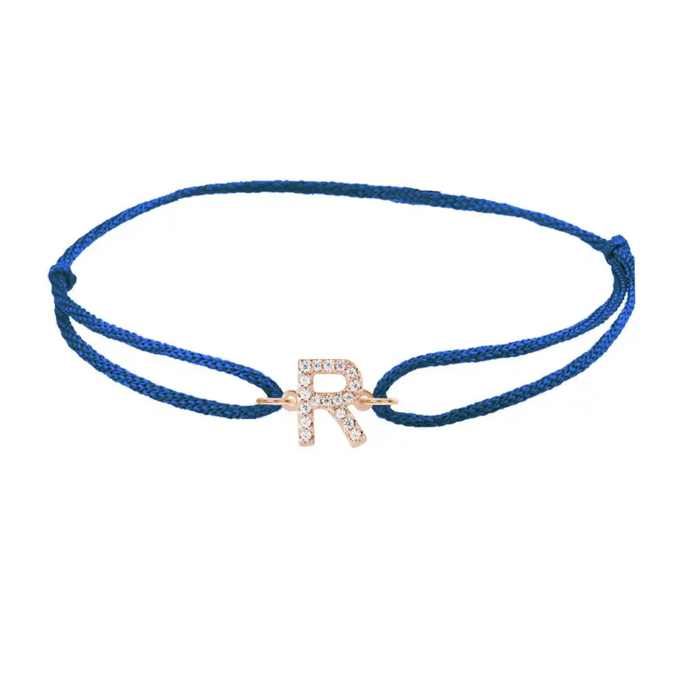 Diamond initial r silk bracelet in 14K rose gold on blue silk