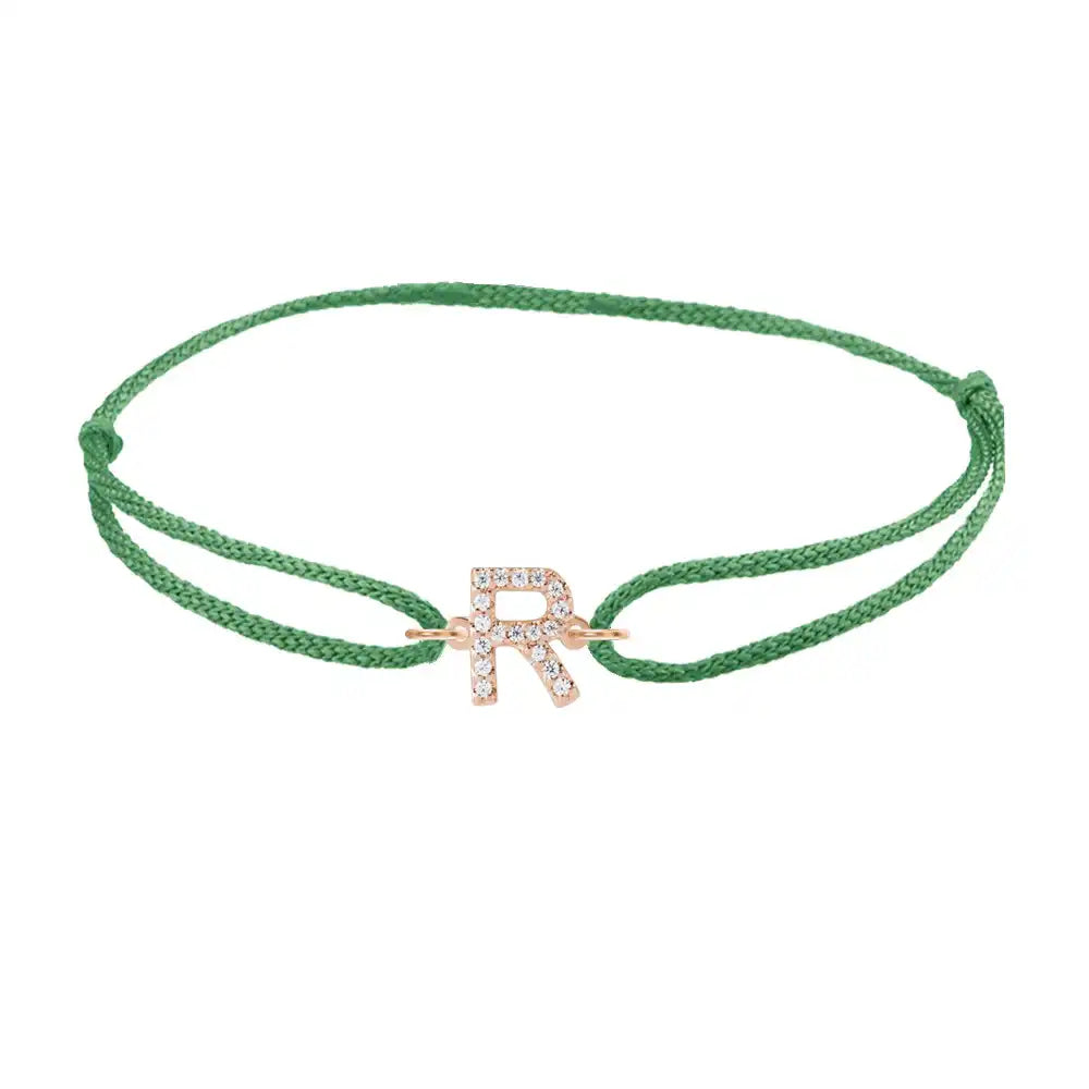 Diamond initial r silk bracelet in 14K rose gold on emerald silk