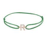Diamond initial r silk bracelet in 14K rose gold on emerald silk