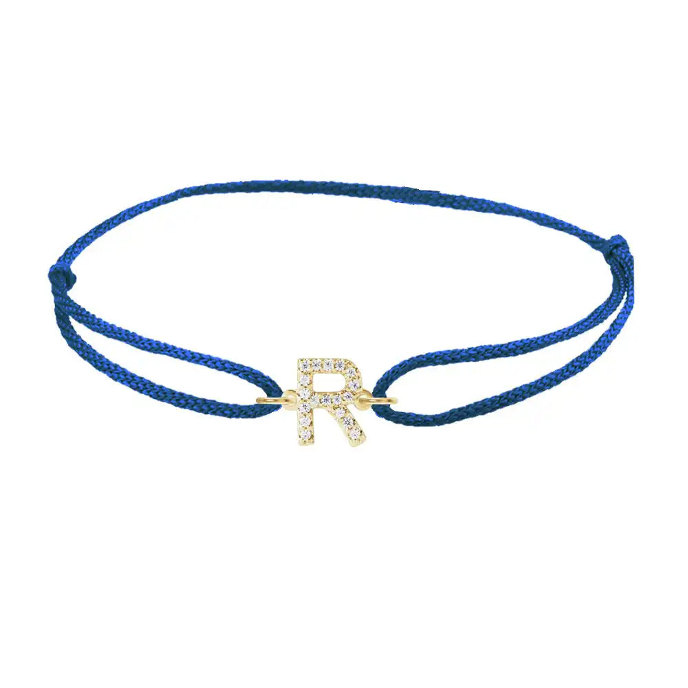 Diamond initial r silk bracelet in 14K yellow gold on blue silk
