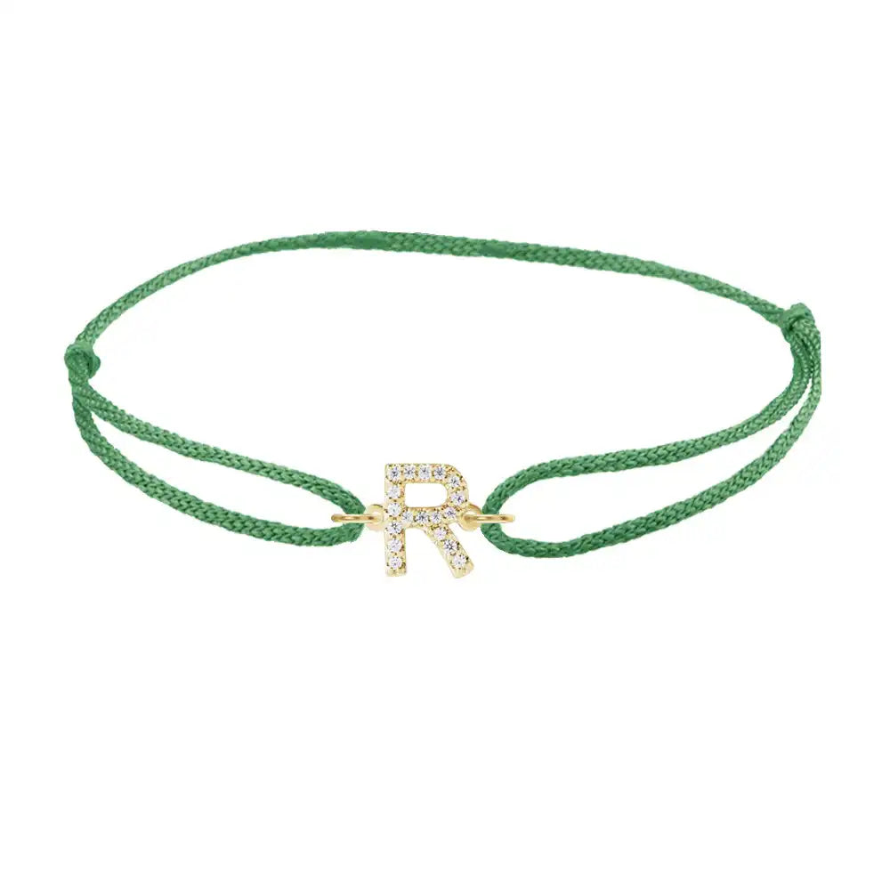 Diamond initial r silk bracelet in 14K yellow gold on emerald silk