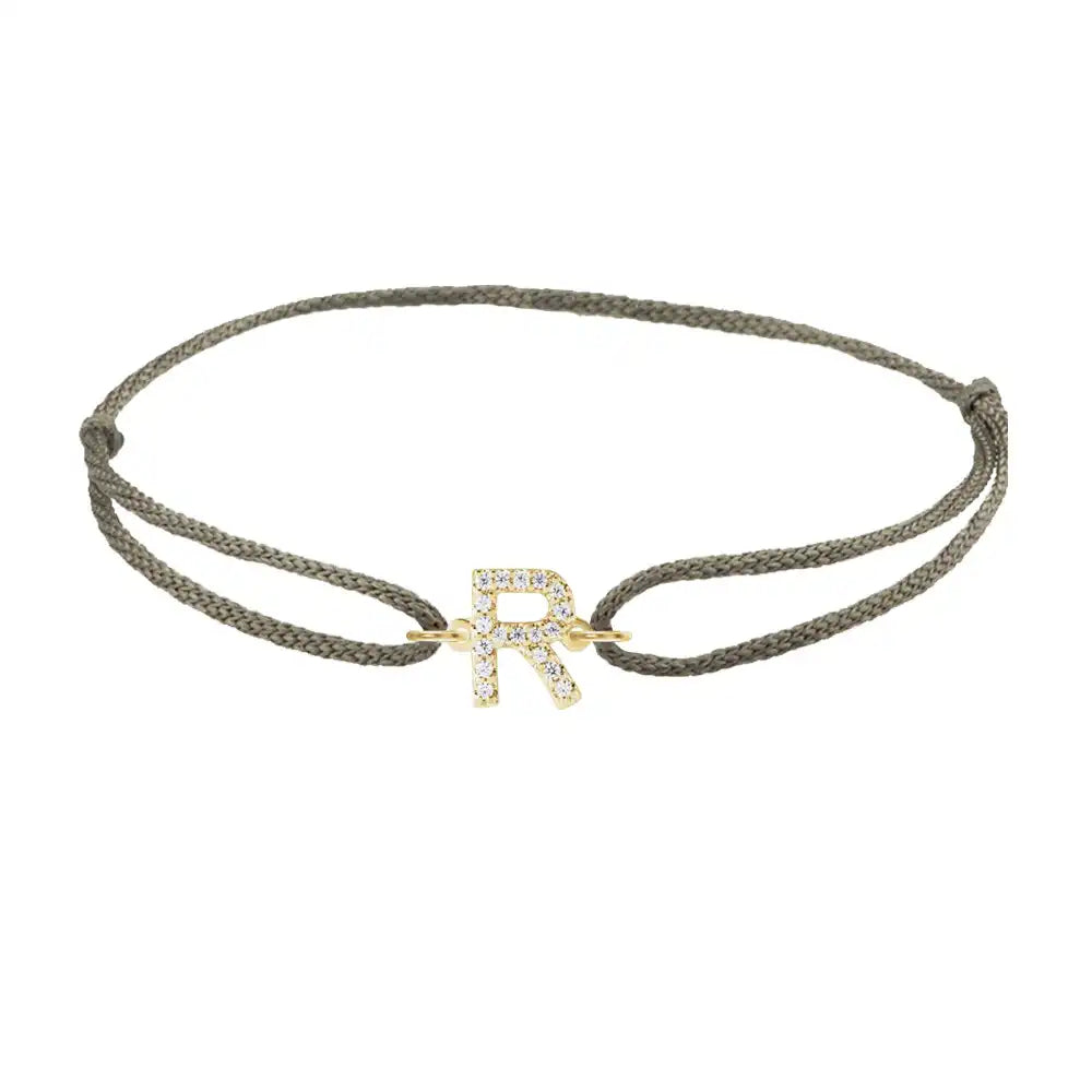 Diamond initial r silk bracelet in 14K yellow gold on olive silk