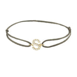 Diamond initial s silk bracelet in 14K yellow gold on olive silk