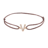 Diamond initial v silk bracelet in 14K rose gold on brown silk