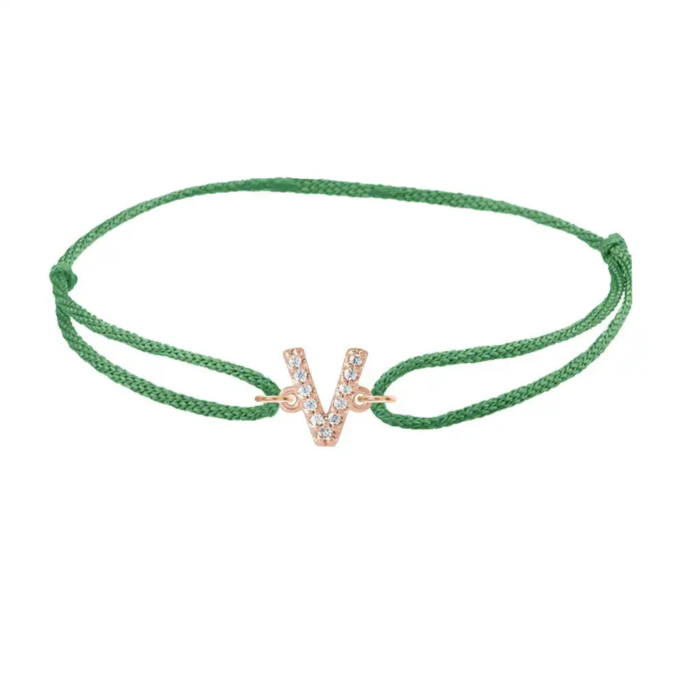 Diamond initial v silk bracelet in 14K rose gold on emerald silk